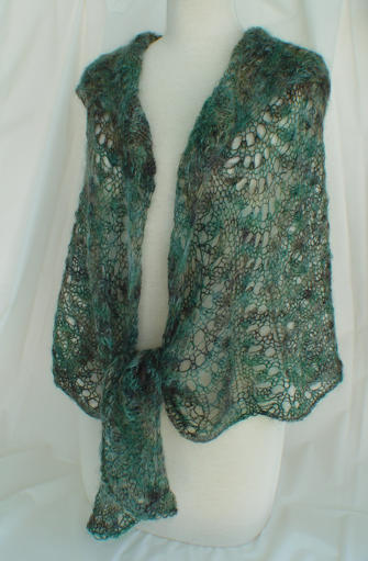 The adaptable Elegantly Simple Triangle Shawl worn in an alternative fashionable style