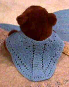 Doll-sized Faroese shawl on teddy bear