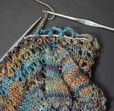 demonstration of crochet bind off technique