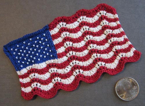Mini Lace and Beaded Flag, a miniature knitted version of the American flag