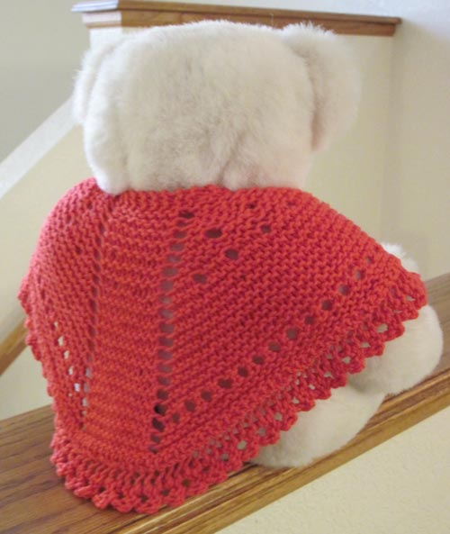 back view of A Bit of Lace Dolly Shawl shows the traditional center gusset of Faroese shawls and eyelet shaped shoulders