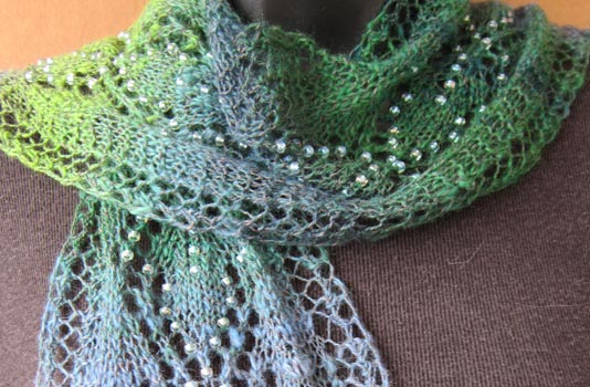 Spring Raindrops Lace Leaves Scarf. Sparkly beads glisten like raindrops, greeting the awakening of Spring's first leaves.