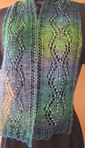 Spring Raindrops Lace Leaves Scarf. Sparkly beads glisten like raindrops, greeting the awakening of Spring's first leaves.
