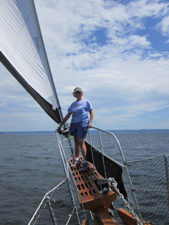 Jackie on the bow of the Amoeba sailboat