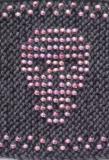 Spooky Beaded Treat skull motif