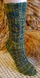 A Feat of Twist Socks in Schaefer Heather