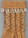 Partially turned down cuff on the Daylight and Shadows Beaded Cable Socks